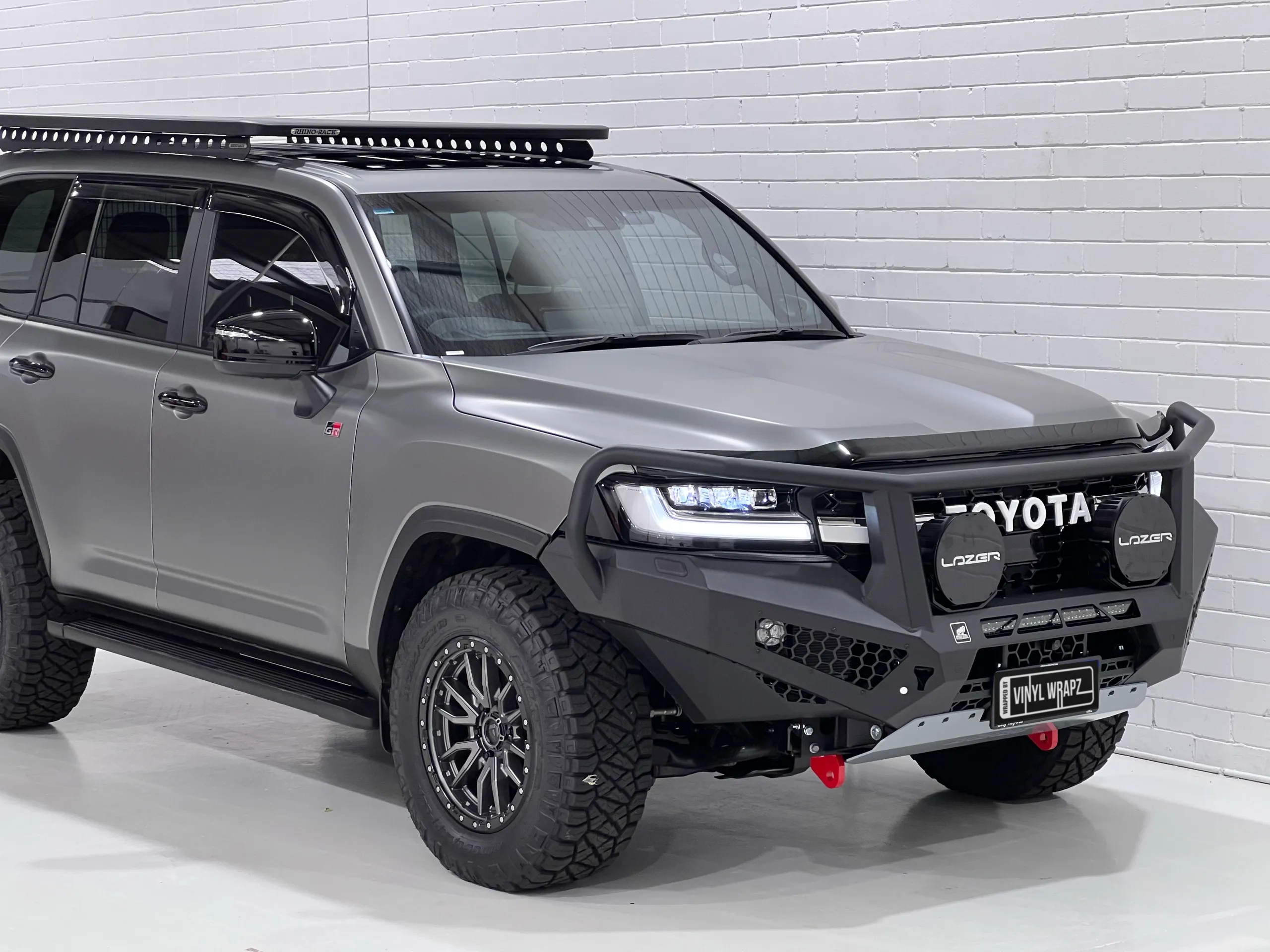 Matte slate grey Toyota LandCruiser 300 Series GR Sport, front quarter