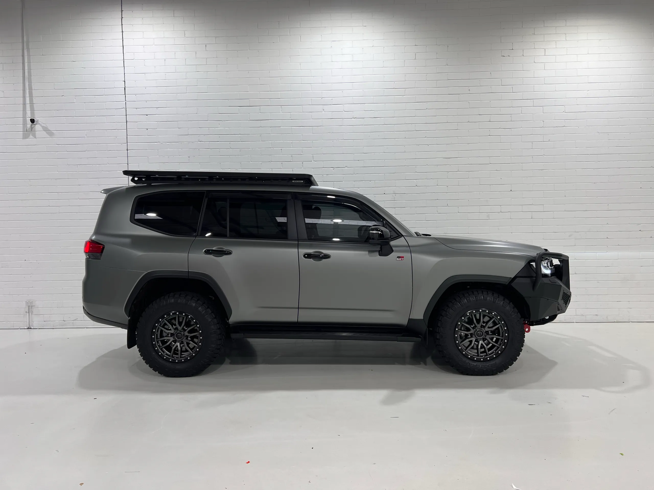 Matte slate grey Toyota LandCruiser 300 Series GR Sport, side