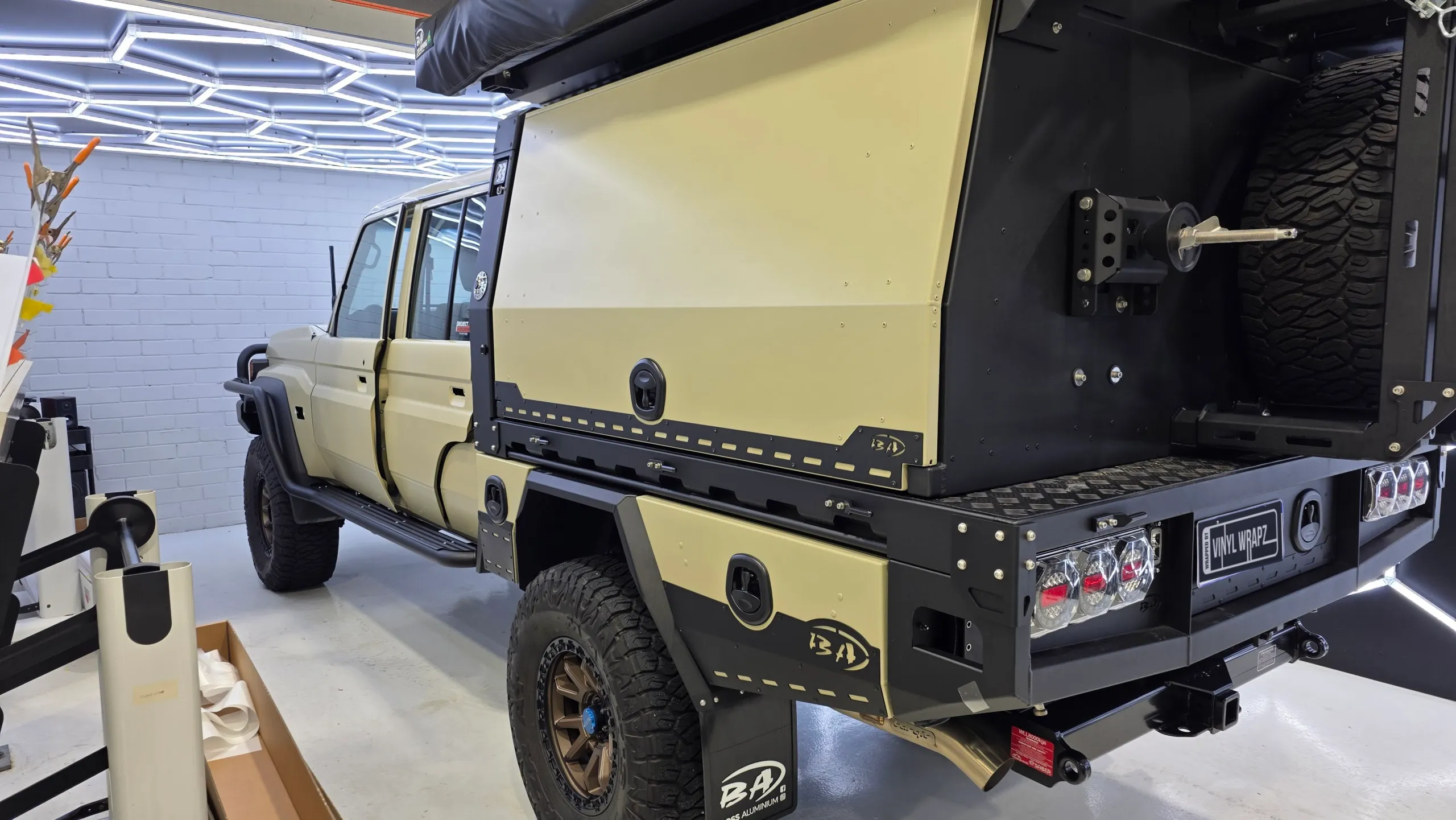 LandCruiser 79 canopy and rear storage boxes in the workshop during wrapping