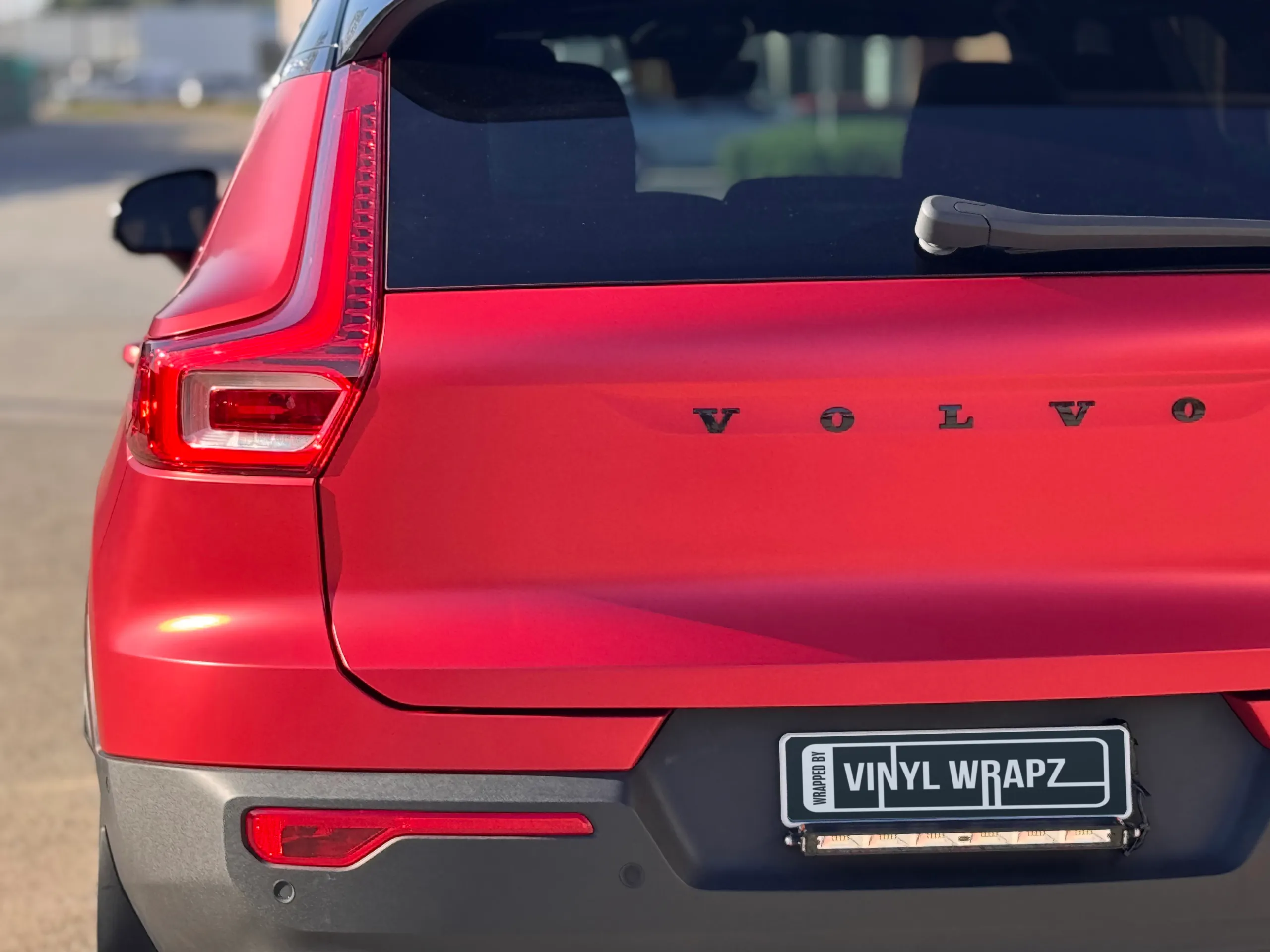 Volvo lettering and rear light on the red XC40 tailgate