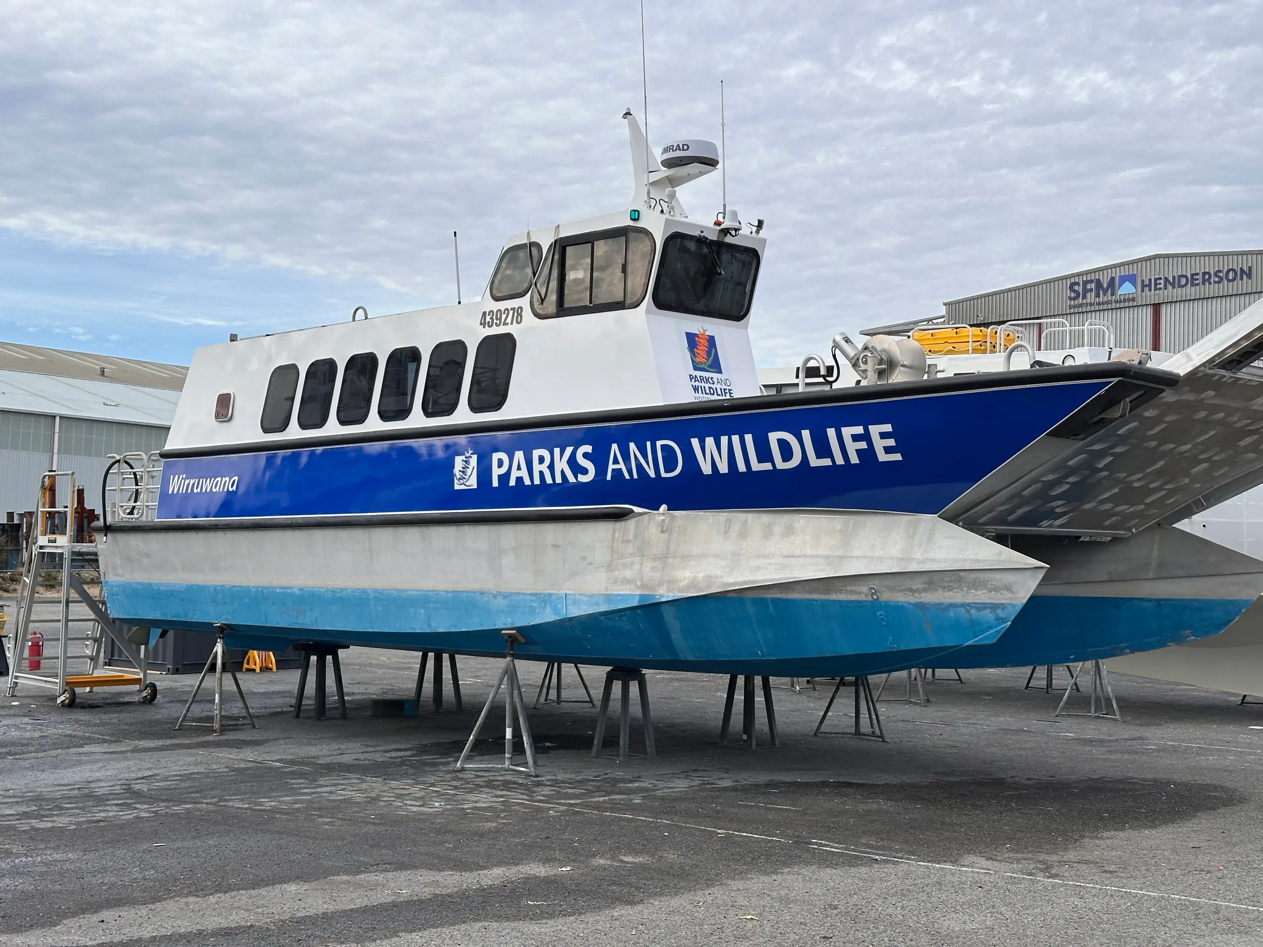 Wirruwana vessel on stands with blue Parks and Wildlife side graphics fitted